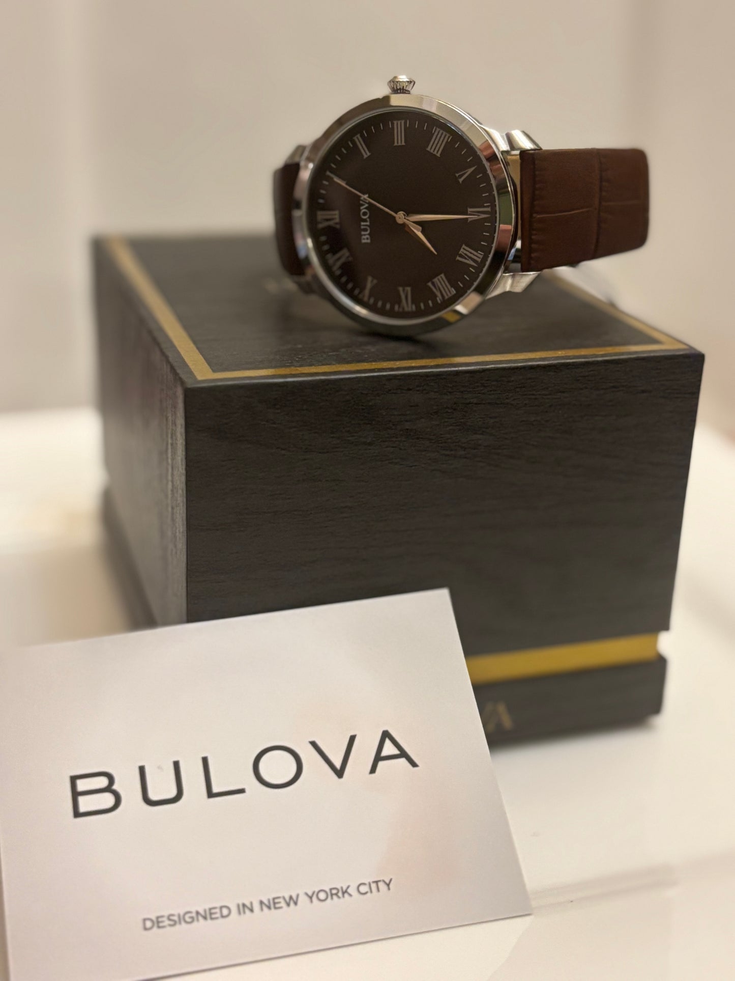 Bulova Classic 96A184 Men’s Black Dial Roman Numeral Brown Leather Watch