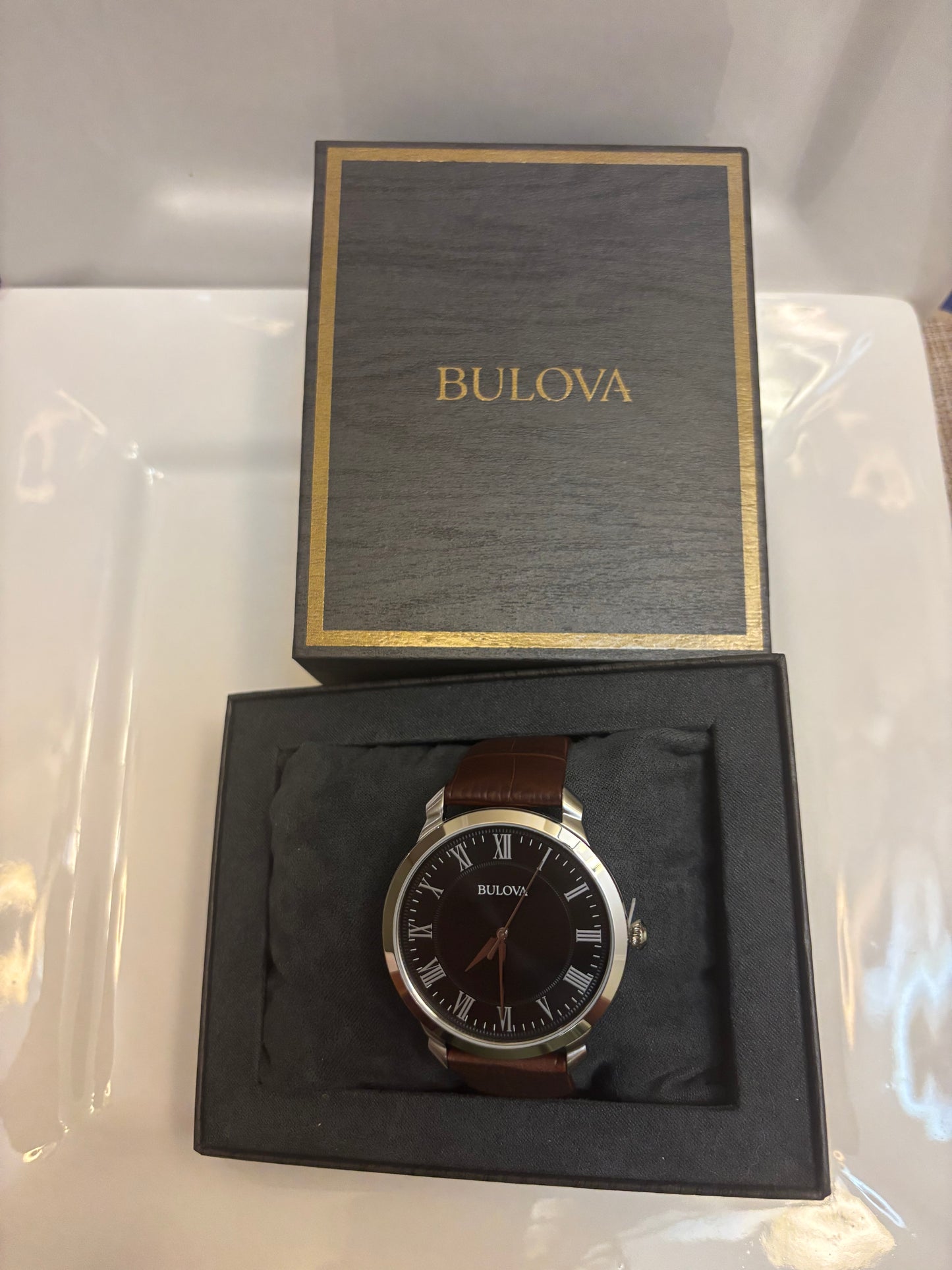 Bulova Classic 96A184 Men’s Black Dial Roman Numeral Brown Leather Watch