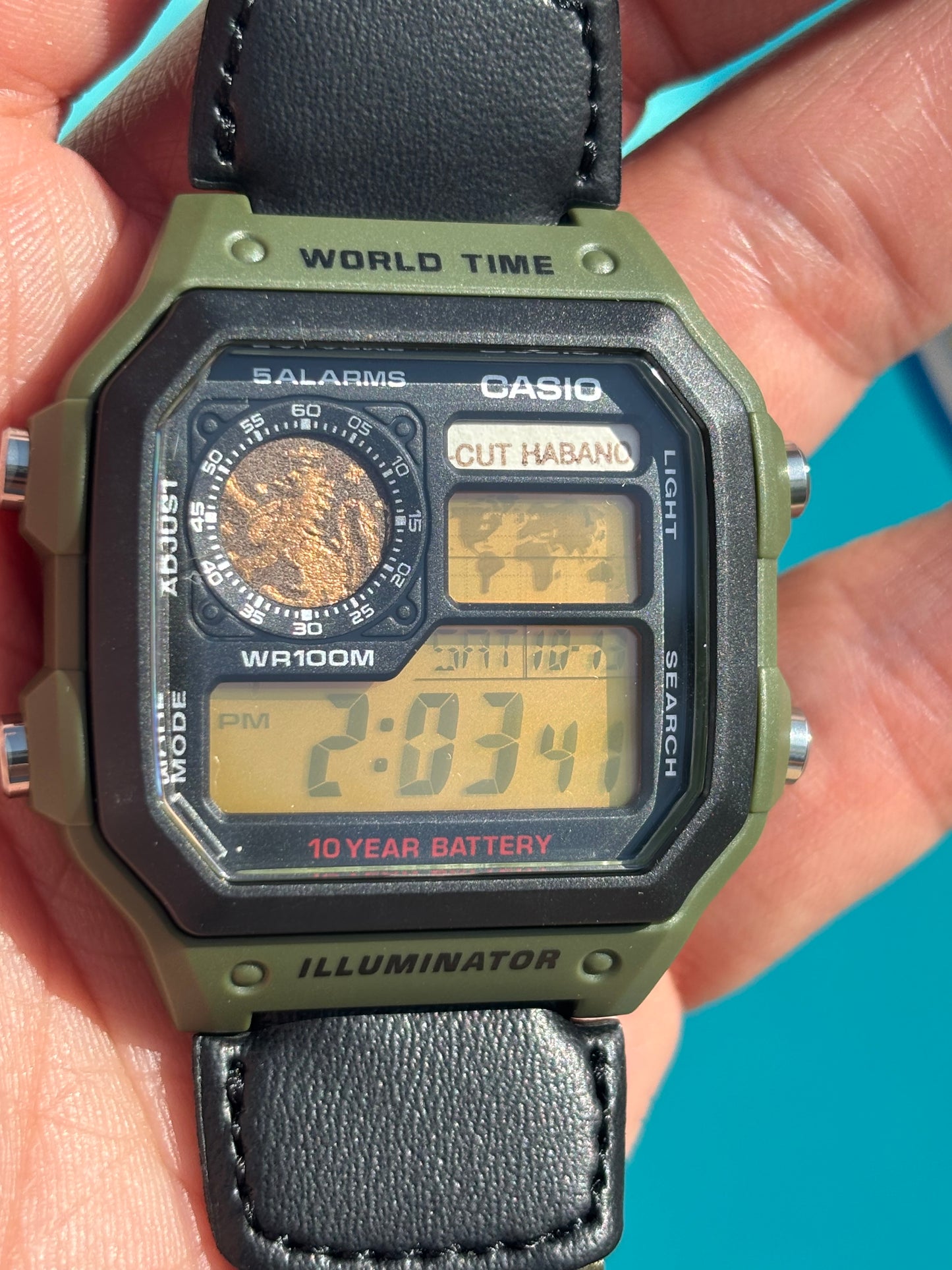 Custom Casio World Time Mod – Cigar Band “CUT HABANO” + Orange Gel Filter | Olive Green Strap