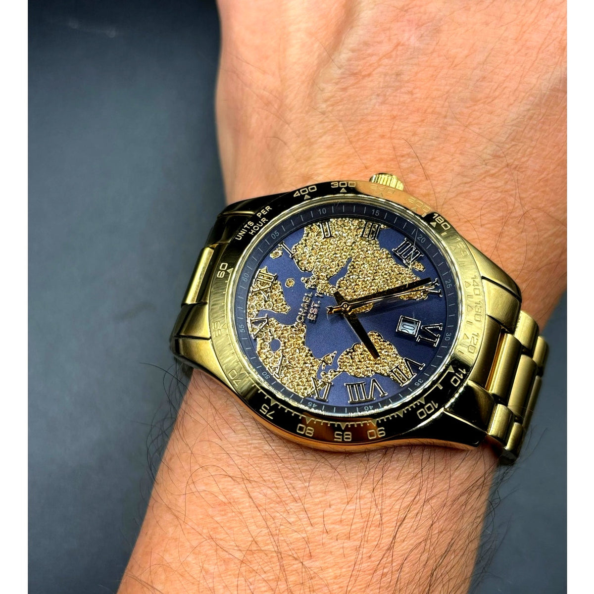 Michael Kors Layton MK6243 Gold Tone Blue Crystal Pave Globe Watch 44mm