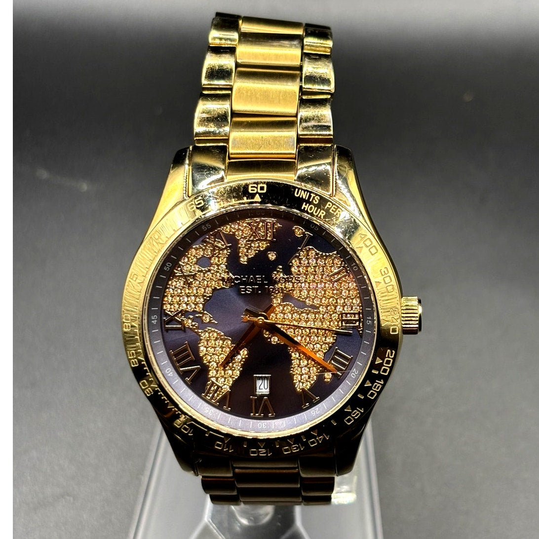 Michael Kors Layton MK6243 Gold Tone Blue Crystal Pave Globe Watch 44mm