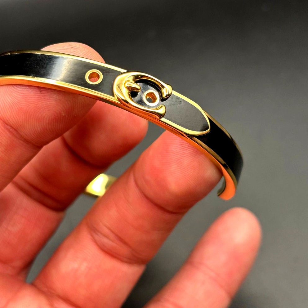 Coach 408104GLD001 Thin Enamel Signature Push Hinged Bangle Gold/Black NWT