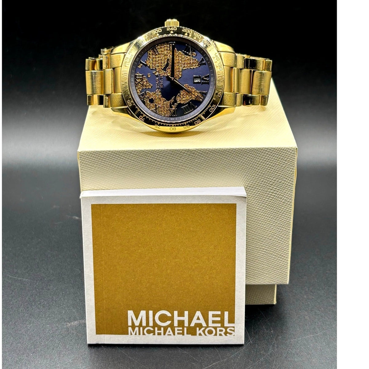 Michael Kors Layton MK6243 Gold Tone Blue Crystal Pave Globe Watch 44mm