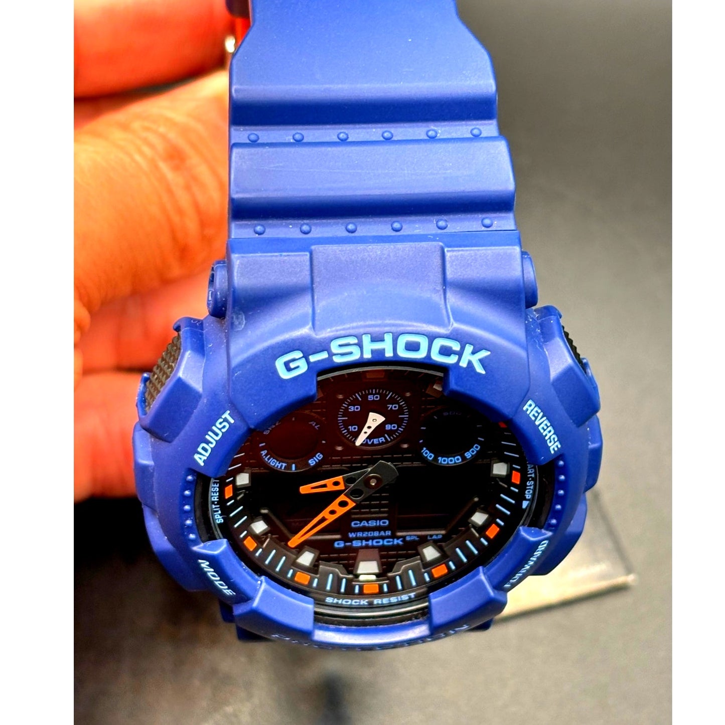 Casio G-Shock GA100L-2A Military Blue Orange Band Men's Analog-Digital Watch