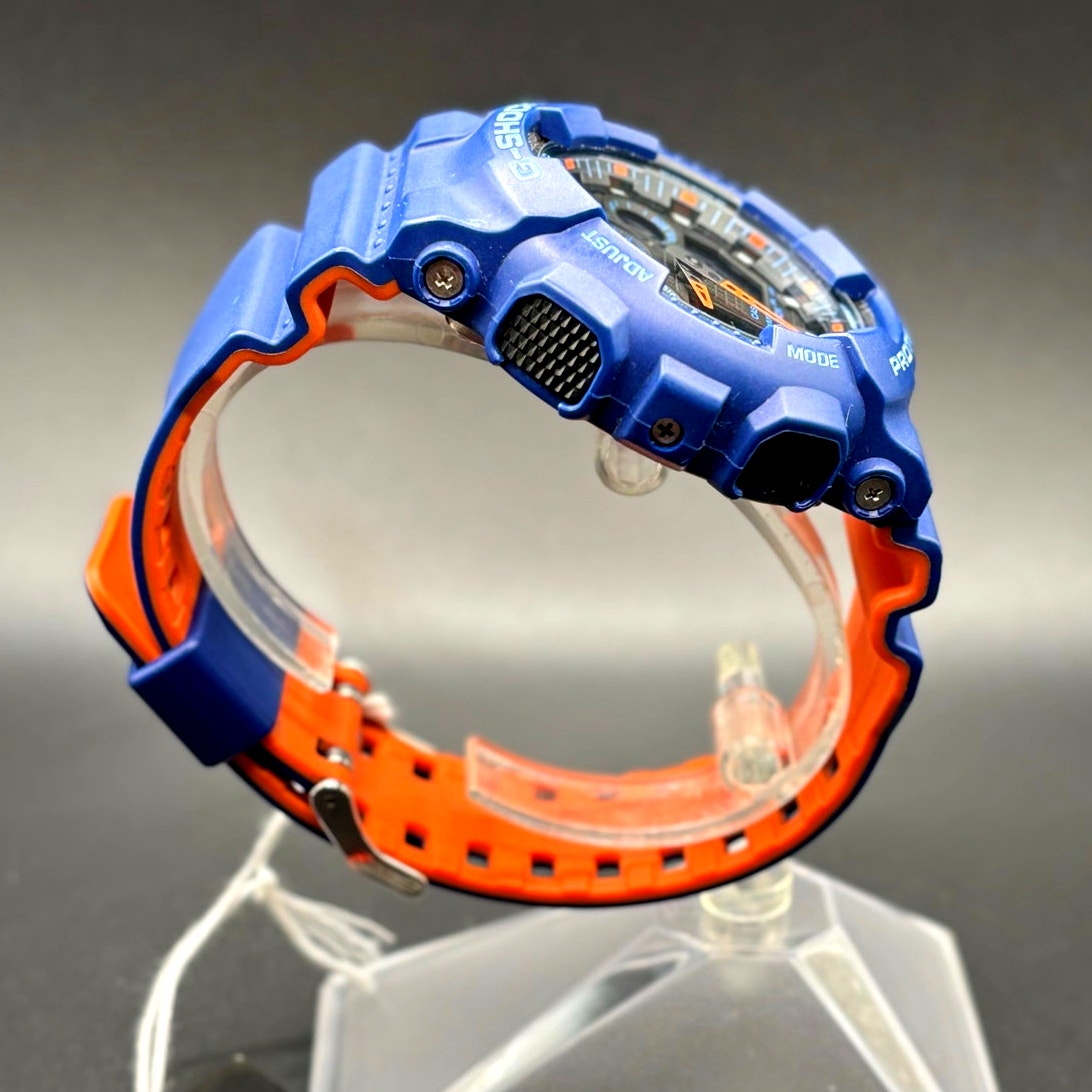 Casio G-Shock GA100L-2A Military Blue Orange Band Men's Analog-Digital Watch