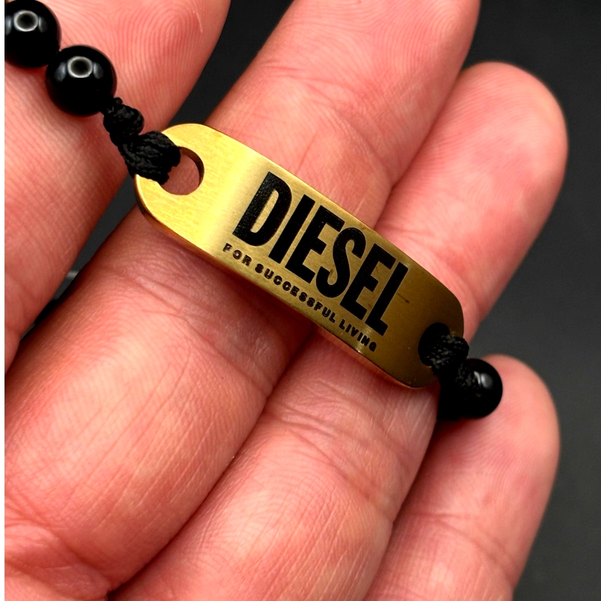 Diesel DX1360710 Men’s Black Bead Gold Tone ID Adjustable Bracelet NIBWT