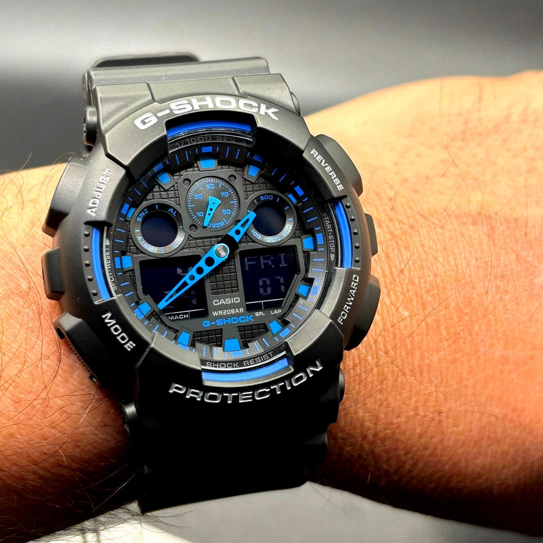 Casio G-Shock GA100-1A2 Men's Black Blue Analog Digital 51mm Watch NIBWT